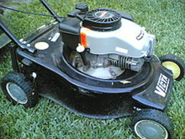 Victa motor lawn mower invented