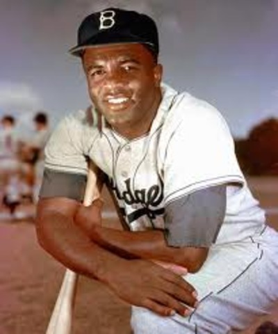 Jackie Robinson breaks "color barrier"