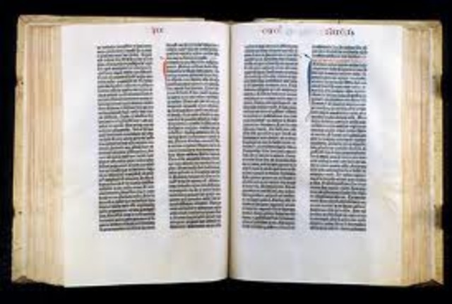 Gutenberg prints the Bible