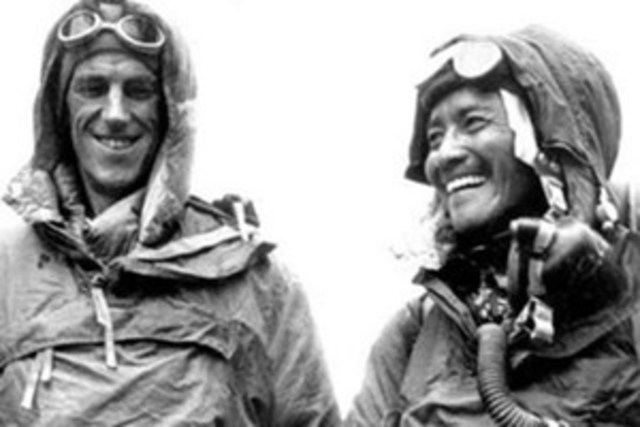 Sir Edmund Hilary climbs Mt Everst