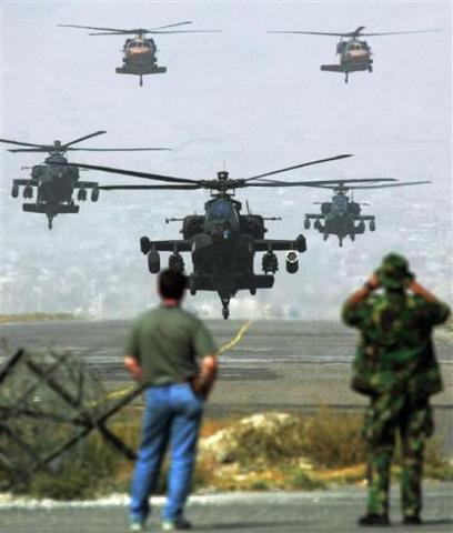 Britain, US carry out bombing raids to try to disable Iraq's air defence network.