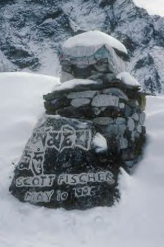 Fischer was buried above the South Col as the team regroups.