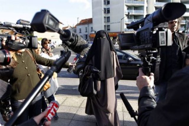 2 women fined for wearing the niqab in public.