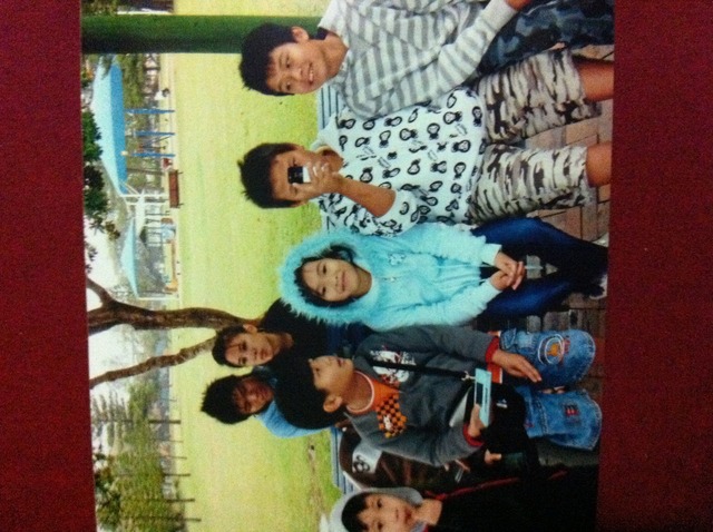 Cousin trying to take a photo of my mum