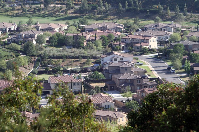 Woods Valley, the town's first suburban-style subdivision, is built
