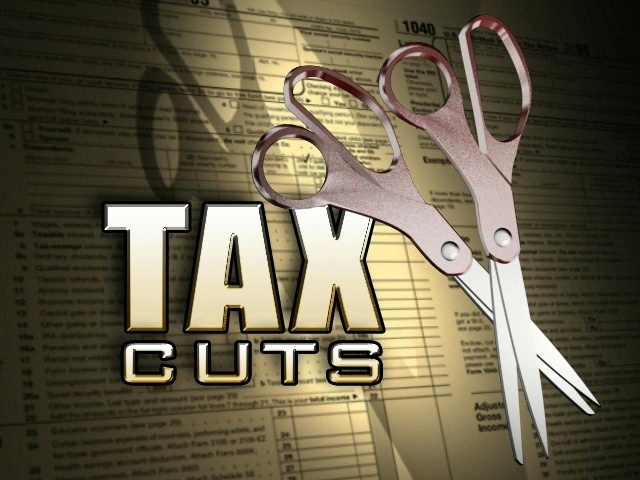 President Hoover signs income tax reduction bill