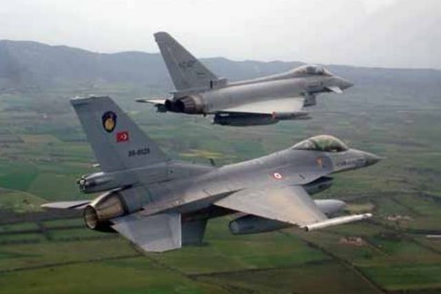 The U.S and Britain launch air strikes againest Iraq