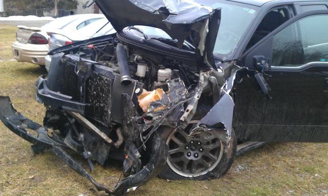 Hit black ice, slid into a tree, totaled F150