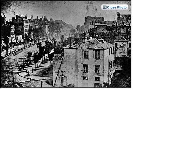 The first photo of a person