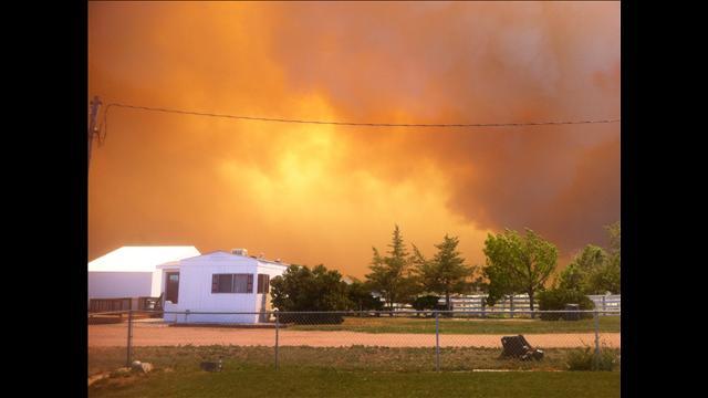 1:36 p.m - A hundred homes lost