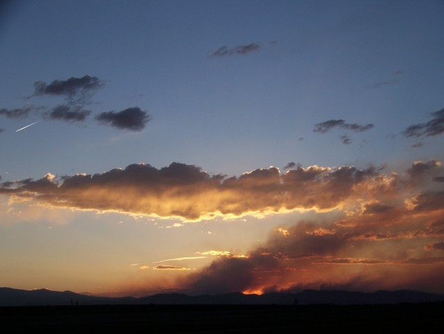9:30 a.m. - Firefighters try to steer fire away from Fort Collins