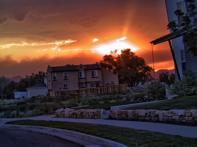 10:45 a.m. - Some residents allowed back into fire area