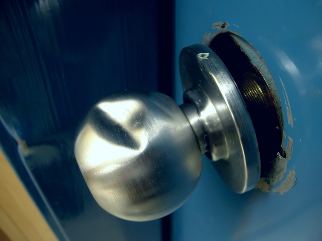 Acuple of months later we put Tyson in the basement while we were gone and he bit the door knob and opend the basement door