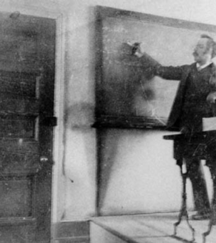 Frost is an English teacher at New Hampshire Normal School (now Plymouth State University) in Plymouth, New Hampshire.