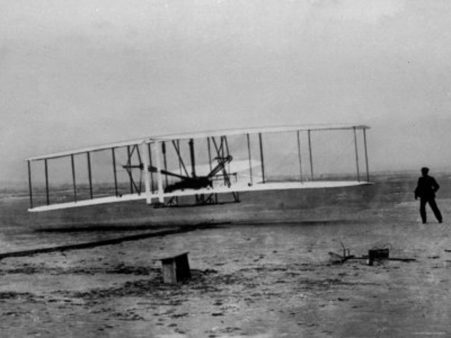 Orville and Wilbur Wright, first airplane