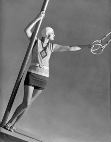 The Jantzen Red Diving Girl patch first appears on bathing suits, Jean Patou monograms his swimsuits