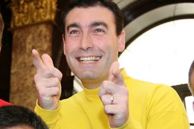 Greg Page (yellow) was unable to continue performing with the Wiggles.