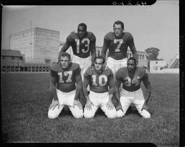 ending of  the 13 years of whites-only football in the NFL.