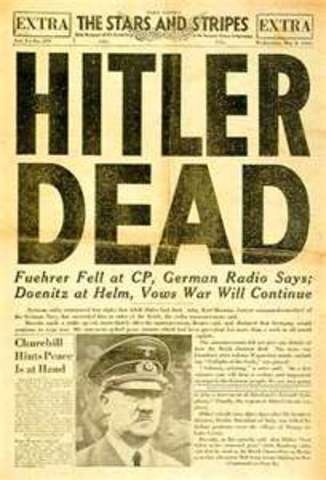 Adolf Hitler commits suicide