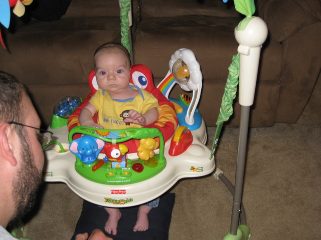 Logan's fist time in the Jumperoo