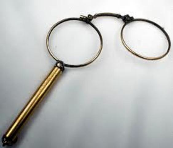 German artificial eye maker Frederick Muller fits a thin glass contact scleral shell to a patient who was missing a lower lid