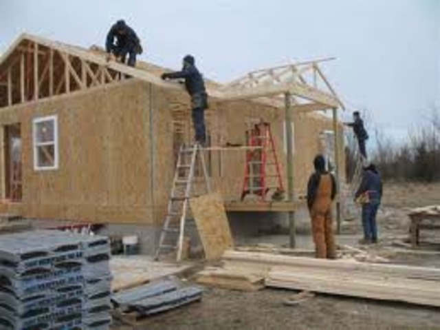 Putting sheeting on the walls