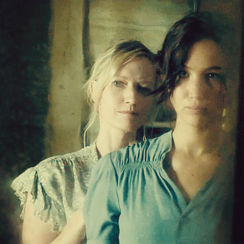 Katniss’s mom helps Katniss by helping her look nice for the reaping by using her old clothes
