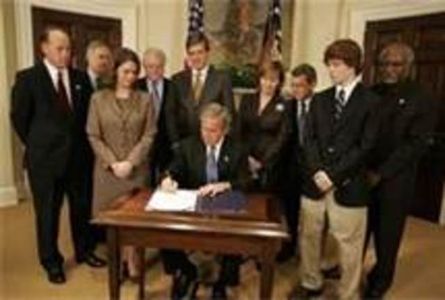 President George W. Bush promotes legislation that would gurantee comprehensive mental health coverage.