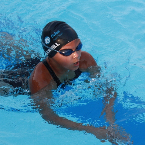 Started competitive swimming