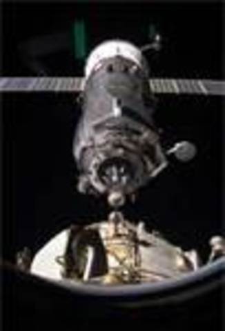 First Human to dock to space vehicles together.