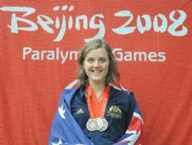 youngest swimmer on the Beijing team, winning silver and bronze medals