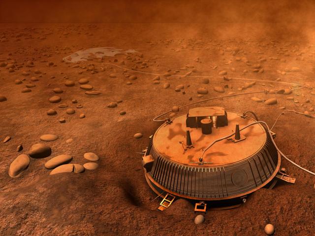 The Huygens probe successfully landed on Titan, returning images of the surface.