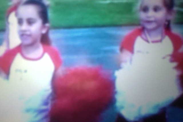 me and skylar cheerleading:)