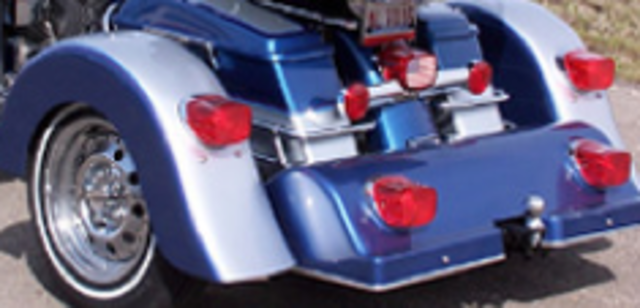 Voyager introduces new low style rear mud guard for trike.