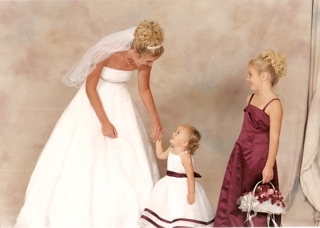 Me as a flower girl at a wedding