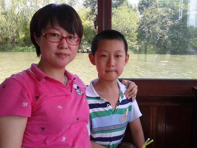 go to Hangzhou by train to meet my husband and my boy who were on trip there.