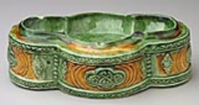 Son-ts'ai (three color) glaze was invented.
