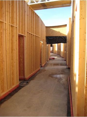 Frame and roof building