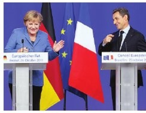 La risatina di Merkel e Sarkozy