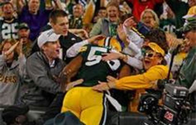 Take my mom to a green bay packers game