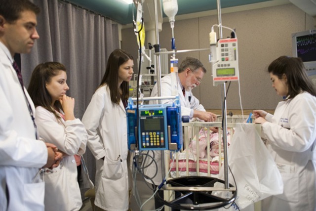 Graduate from medical school with a masters and start residency