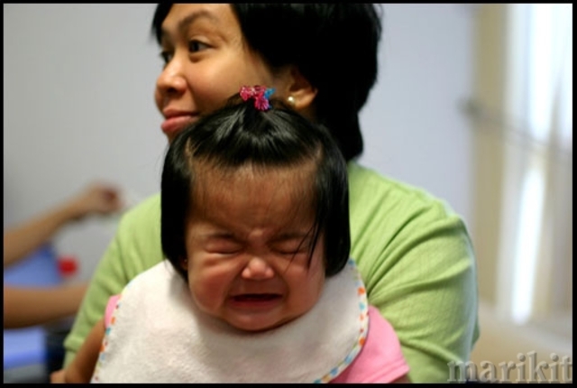 Develop stranger anxiety.