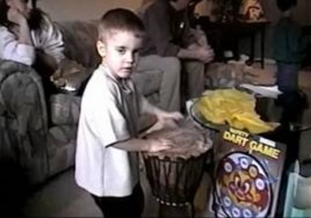 Justin starts playing the drums