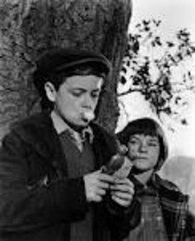 Jem and Scout found two wooden dolls in the hole of the tree