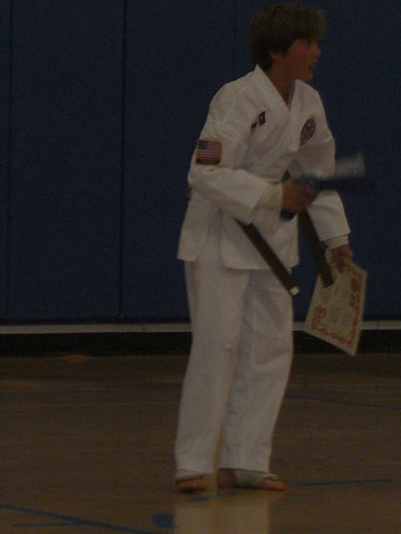 achivied brown belt with stripe