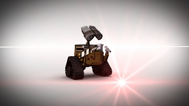 WALL-E discovers laser and chases after it