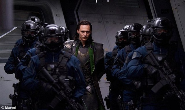 Loki is escorted back to SHIELD base.