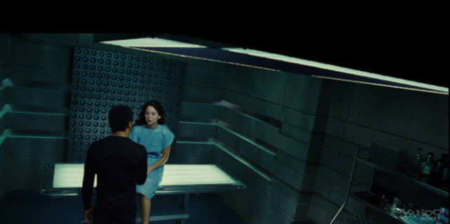 Cinna helps Katniss get ready for the opening ceremony