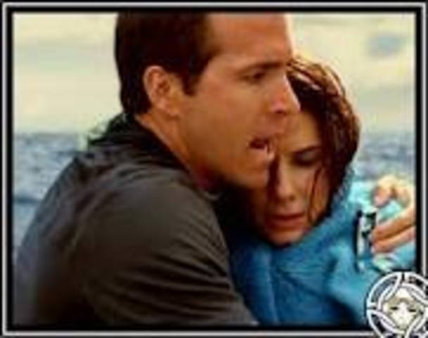 Andrew gets her back into the boat, and hugs her because she's cold. Again, you can tell they like each other