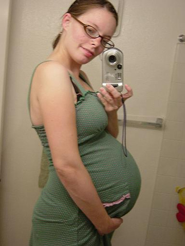 8 months pregnant belly